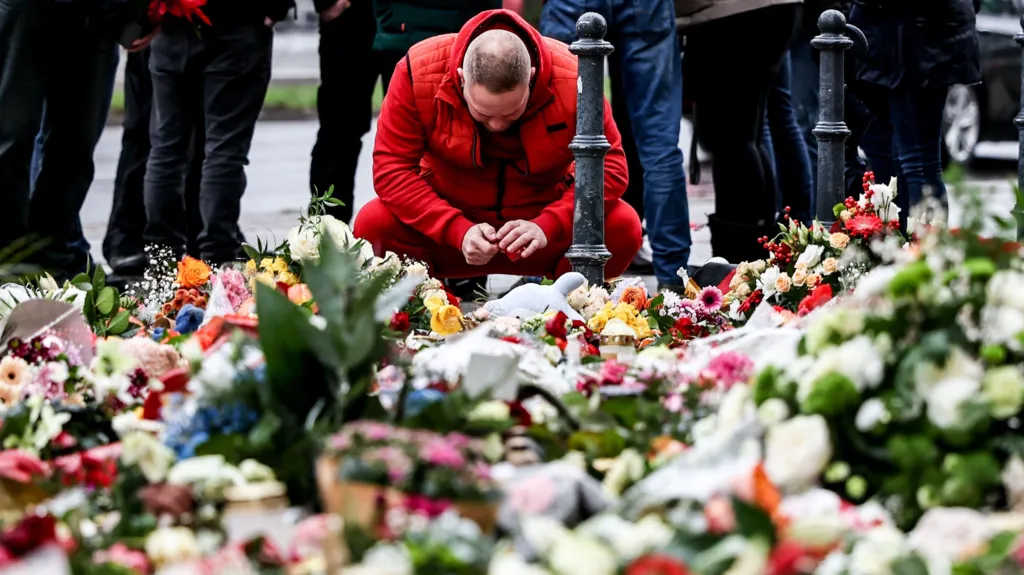 People have been leaving floral tributes for the victims of Friday's attack on the Christmas market in Magdeburg, Germany